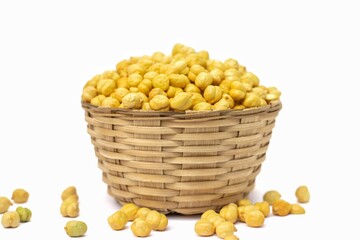 Roasted Garbanzo Bean or Chickpea in a Bamboo Basket Isolated on White Background with Copy Space, Also Known as Bengal Gram or Egyptian Pea in Horizontal Orientation