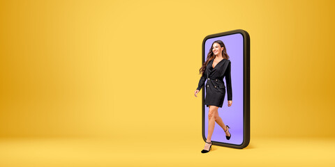 Businesswoman coming out of mockup phone display, copy space background