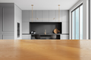 Molding kitchen interior with eating and cooking space, blurred. Mockup table