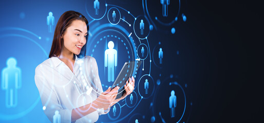 Businesswoman with tablet and glowing people icons, social network