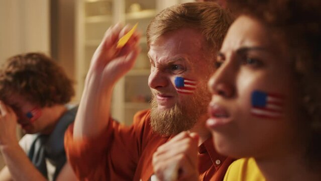 American football fans watching sport match on tv, cheering for USA team. European games and World sport cup 2026, USA, Canada, Mexico. Football, sports and soccer fans. Paris games, Slow Motion