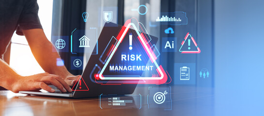 Man hands typing on laptop, risk management hologram with glowing icons