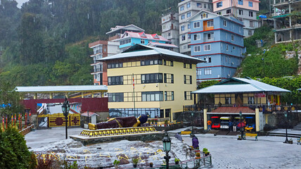 INDIA, SIKKIM, December 2023, Tourist, at View of Ravangla town in snowfall.