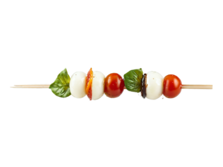 Mini Caprese Skewers Fresh mozzarella ripe cherry tomatoes and fragrant basil leaves drizzled with rich