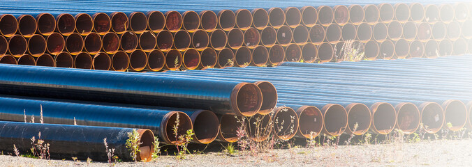 New spare metal pipe of the gas station on sunlight