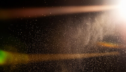 Designed film texture background with heavy grain, dust and a light leak Real Lens Flare Shot in Studio over Black Background