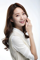 Fototapeta premium Beauty woman model long hair with korean makeup style on face and perfect skin on isolated beige background. Facial treatment, Cosmetology, Spa, Aesthetic, plastic surgery