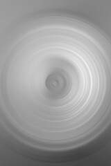 Obraz premium grey circle ripple pattern silver white capillary wave top view blurry swirl texture abstract background