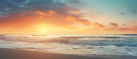A sunrise captured with a scenic beach background in a photograph showing a tranquil copy space image - Powered by Adobe