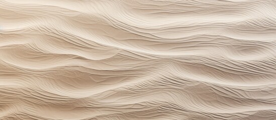 The textured grooves on the sandy ocean floor create an interesting backdrop for a copy space image