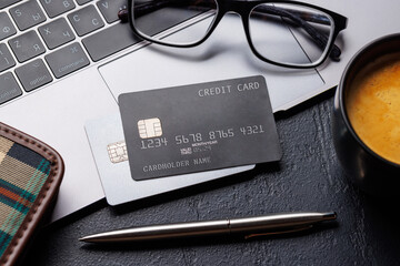 Black credit card on office table