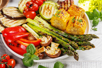Assorted grilled vegetables on a plate, showcasing a colorful meal