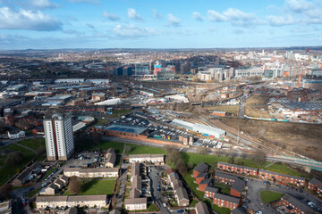 Aerial photo of the British town of Leeds in West Yorkshire UK, showing the Leeds City Centre taken with with a drone on a bright sunny day in the town of Holbeck near to the centre.