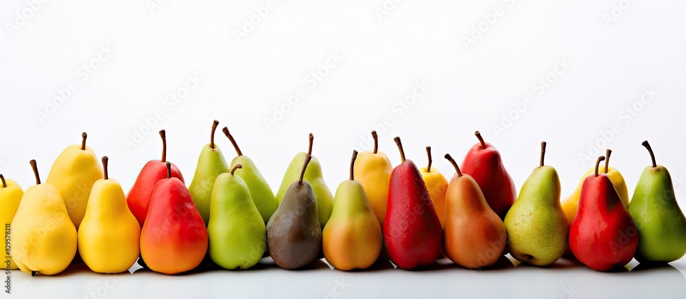 Aufkleber colorful ripe pears arranged for display on white background with ample copy space image