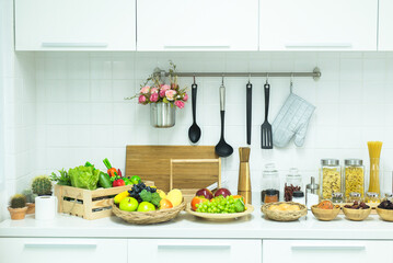 Fresh fruits and vegetable,kitchenware,condiments in kitchen,Healthy lifestyle food concept