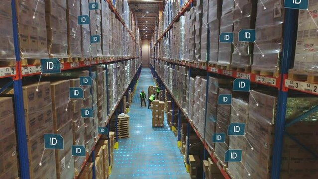 Artificial intelligence analyzes the goods in the warehouse. Scanning product IDs in a modern warehouse. The appearance of plates with ID of goods in the warehouse. Product scanning process.