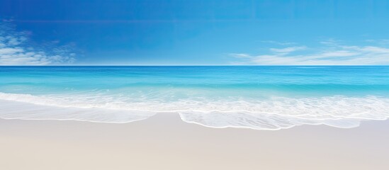 Scenic beach with crystal blue ocean and clear sky perfect for a copy space image