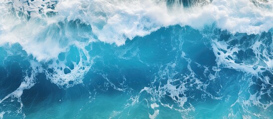 An impressive aerial photo showing ocean waves crashing in deep waters ideal for backgrounds A drone s bird s eye perspective captures the dynamic seascape in this captivating copy space image