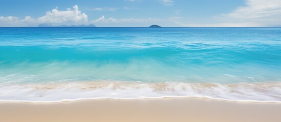 Obraz premium Caribbean sea lapping against sandy shores creating a serene tropical scene with pristine beaches and crystal clear waters in the background of a copy space image