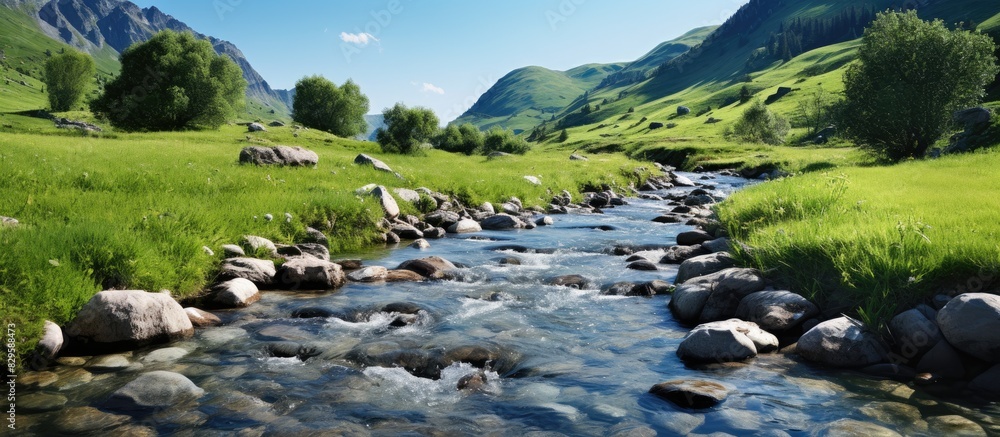 Poster mountain stream on a summer day with water foaming in the riverbed providing a source of moisture fo