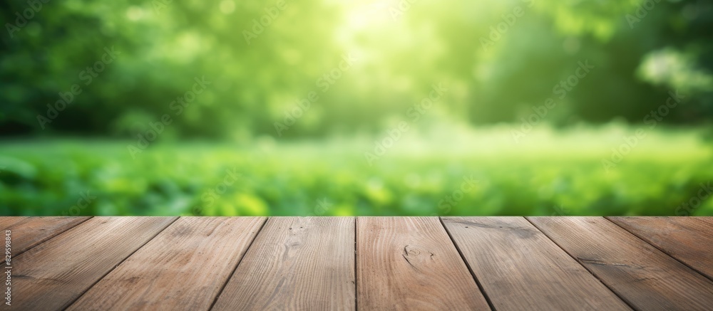 Poster blurred green background with a wooden table top for copy space image