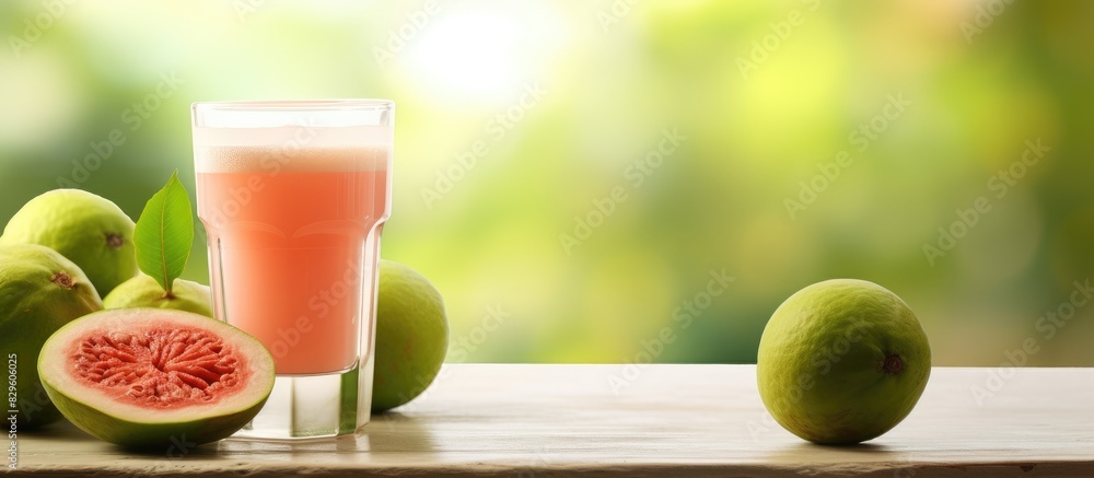 Poster guava juice glass placed on the table with a blank space in the background. copy space image. place 