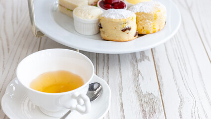 Afternoon tea stand with sweet treats, Afternoon tea set with dessert, High tea set with dessert.