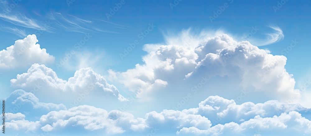 Poster a serene blue sky with fluffy white clouds is an ideal choice for a background image on a website or