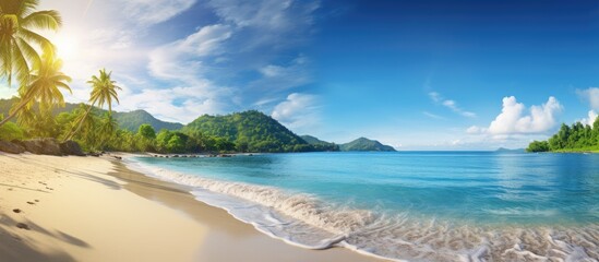 Naklejka premium Stunning tropical beach with crystal clear waters and a serene atmosphere perfect for relaxing vacations with a picturesque view including a sunset. Copy space image. Place for adding text and design