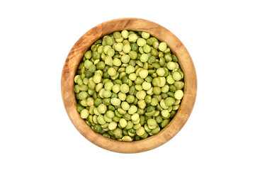 Green split peas in a wooden bowl isolated on white background.
