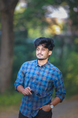 Close-up portrait of young Asian/Indian man