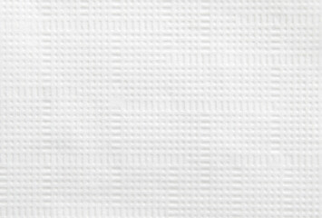 A sheet of clean tiled white tissue paper as background