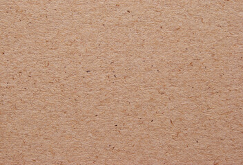A sheet of brown recycled cardboard texture as background
