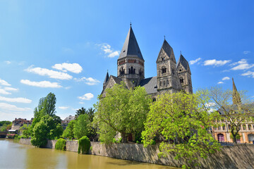 Fototapeta premium Metz, France. Temple Neuf (New Temple) as seen from the banks of the Moselle River. May 9, 2024.