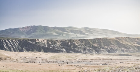 Panorama of mountains, hills and fields in the mountains of Tajikistan, spacious landscape for...