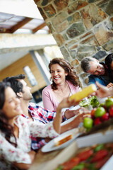 Happy, family and healthy brunch at table together for wellness, corn and salad for nutrition. Diversity, Man and woman with vegetables in home or memories and fresh fruit in diet, eating with smile