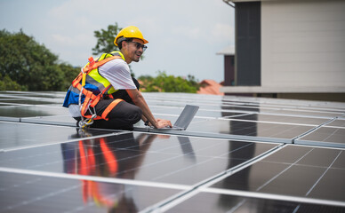 Expertise solar engineer man with computer notebook working on solar roof