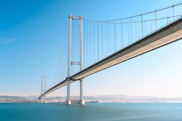 Osmangazi Bridge (Izmit Bay Bridge) located in Izmit, Kocaeli, Turkey. Suspension bridge captured with long exposure technique