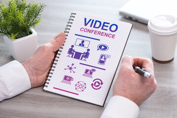 Video conference concept on a notepad