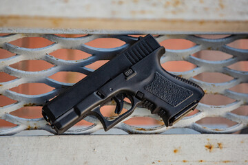 Modern semi-automatic pistol. Armament for the army and police. Short-barreled weapon. Metal...
