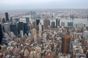 Aerial view of Manhattan in New York City showing the classic high rise buildings and city scape in...