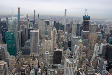 Aerial view of Manhattan in New York City showing the classic high rise buildings and city scape in the USA