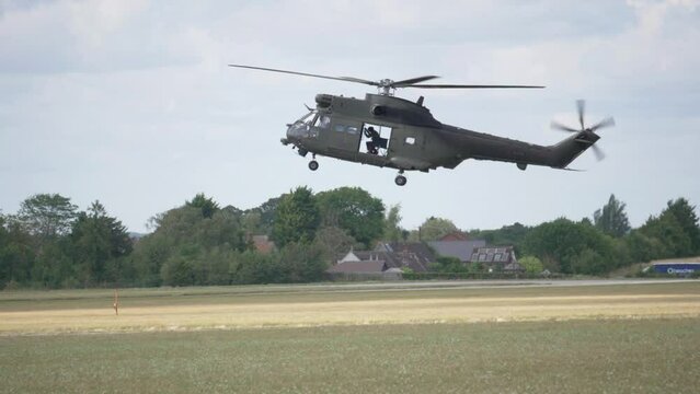 RAF Puma helicopter comes in to land in slow motion