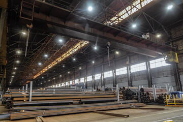 Industrial metalwork production hall and warehousing workshop with overhead crane
