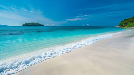 Obraz premium Beautiful white sandy beach with turquoise water and an island in the distance, panorama, blue sky, sunlight.