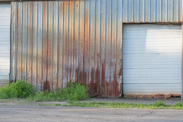 Sheet metal rusted textured selective focus background, garage door, industrial, natural authentic...