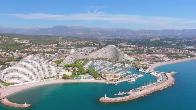 Nice, France: Aerial view of Marina Baie des Anges with yachts and boats in famous resort city by Mediterranean Sea on French Riviera - landscape panorama of Europe from above
