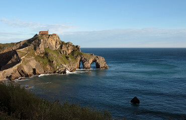 View over San Juan de Gaztelugatxe in Spain during sunrise