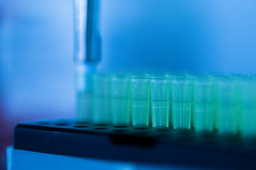 Production line pharmaceutical industry. Manufacturing of drugs and medications, pharmaceuticals. Technician, scientist works in a scientific laboratory	