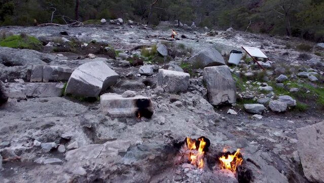 Eternal Flames: Ancient Ruins  Burning. Natural Gas Fireplace Burning Out of Stone Rocks at Mount Chimaera, Turkey. Methane Gas Fires, Near Mt. Olympos, Antalya. Lycia T&uuml;rkiye | 1 of 8
